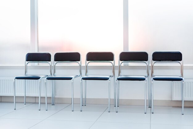 Row of chairs in the office hallway