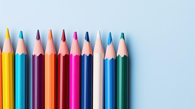 A row of colored pencils with one blue and one red.