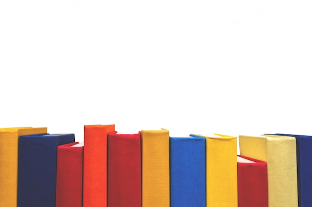 Row of colorful book pines on white background. Isolated. Education and back to school concept. 