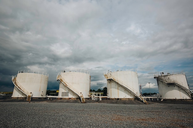 The row of small white tanks for petrol station and refinery spare part.