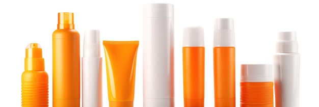 A row of sunscreens, one of which is orange.