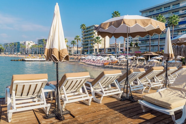 Rows of empty beach lounges in Juan les Pins France