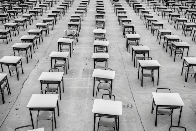 Photo rows of empty school desks