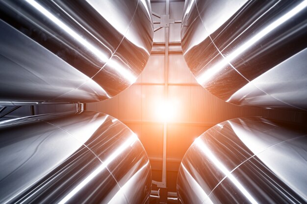 Rows of steel tanks for beer fermentation and maturation in a craft brewery