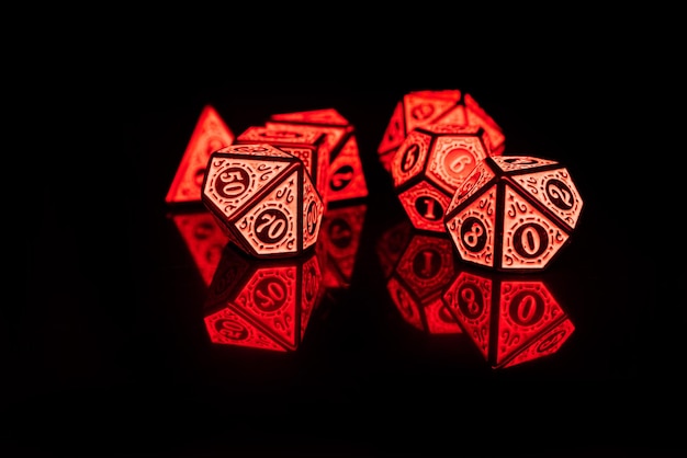 RPG dice illuminated with colored light light painting style photo selective focus