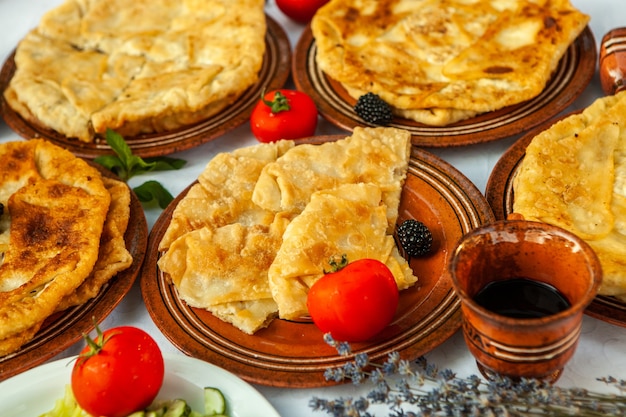 Rraditional fried pies from Romania with potatoes cheese and cabbage Romanian food