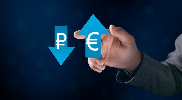 Ruble and Euro exchange rate with up and down arrows Man tapping on the screen