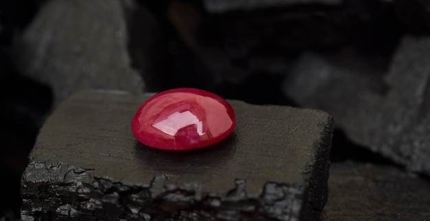 Ruby is a beautiful red gemstone on a black backgroundx9