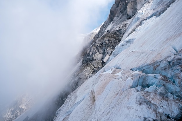 Rugged and dangerous mountain peaks high in the Alps losing their glaciers