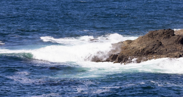 Rugged rocks on a rocky shore on the west coast of pacific ocean