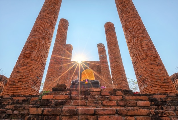 Ruined ancient city and Buddha at Ayutthaya,Thailand.