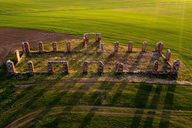 Ruins of an ancient building that looks like Stonehenge drone view Smiltene Latvia