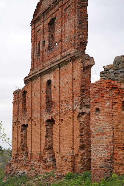 Ruins of an ancient castle ukraine Ruins of expressive red brick gate tower of ancient castle in Korets Ukraine