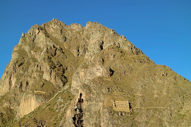 Ruins of Pinkuylluna Incan Storehouses on Pinkuylluna Mountain in Ollantaytambo Province Peru