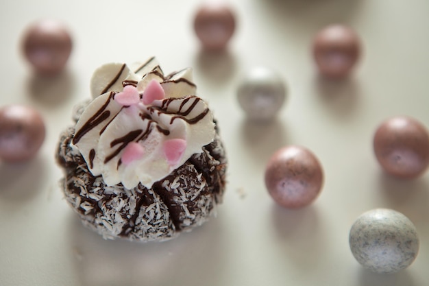 Rum truffle ball with candies coconut homemade no baked cookies from chocolate and coconut flakes