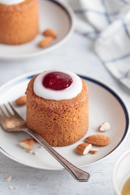 Runebergin Torttuu in a plate on a white table