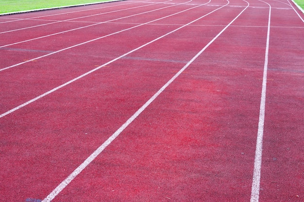 Running track and green grassDirect athletics Running track at Sport Stadium