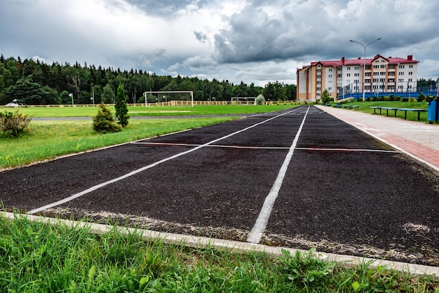 Running track on the stadium. Treadmill on sport field.