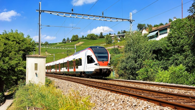 Running train in Lavaux Vineyard Terrace hiking trail, Lavaux-Oron district in Switzerland