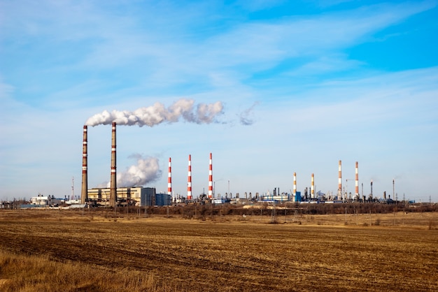 Rural landscape with industry on the horizon