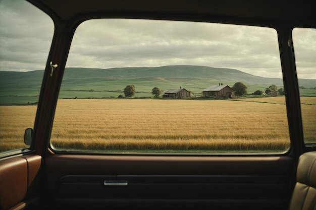 Rural scene seen through car window