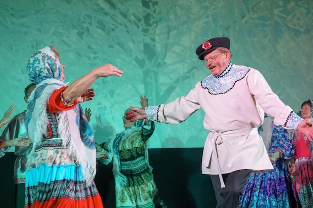 Russia, Gatchina, October 14, 2022 Pensioners perform folk dances at the festival