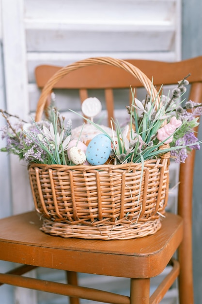 Russia Moscow 04092022 happy easter holiday time in spring season basket with painted eggs easter baked cakes flowers and plants and sweet rabbits festive home decor traditional food