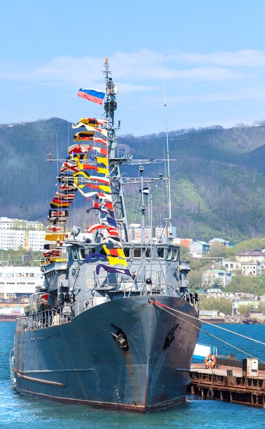 Russia warship with flags on Kamchatka