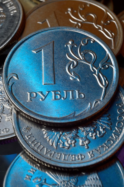 Russian 1 ruble coin is highlighted in blue. close-up.