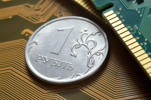 Russian 1 ruble coin lies among the microcircuits a concept illustrating the pricing of electronics in Russia