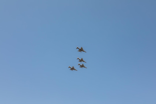 Russian Air Force plane flies in sky, Russia. Bottom view of strike fighter during flight. Military 