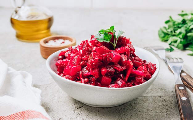 Russian beetroot salad in bowl closeup