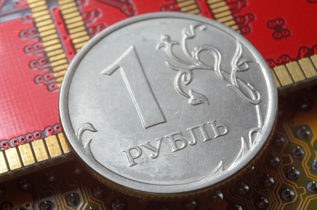 Russian coin with a face value of 1 ruble lies among the microcircuits the concept of the digital economy of Russia