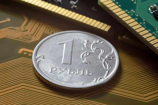 Russian coin with a face value of 1 ruble lies among the microcircuits the concept of the digital economy of Russia