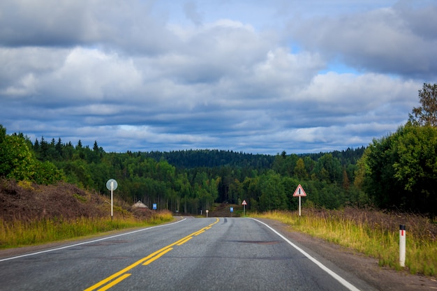 Russian roads in Karelia. Travel by road. Asphalt road. Smooth road