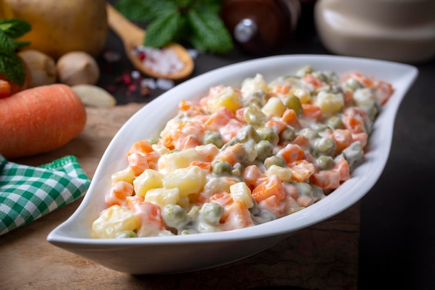 Russian salad Olivier with mayonnaise and egg served (Turkish name; Rus salatasi)