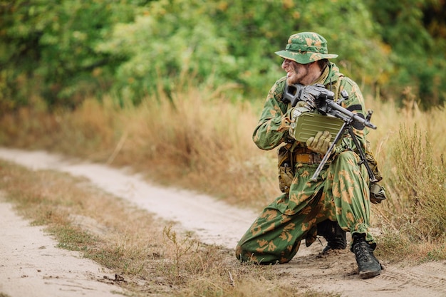 Russian soldier in the battlefield with a rifle