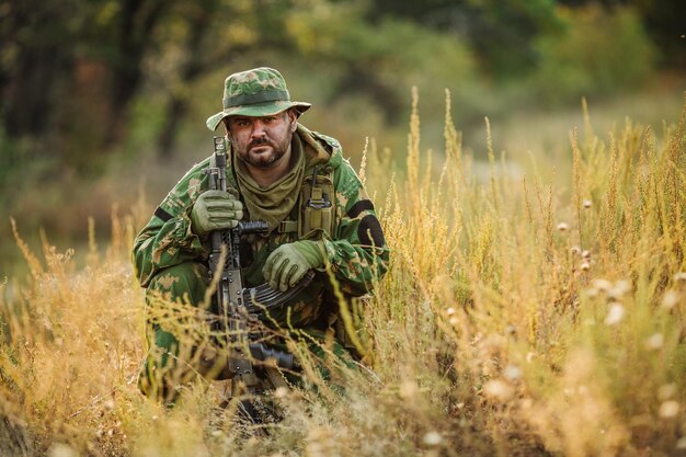 Russian soldier in the battlefield with a rifle