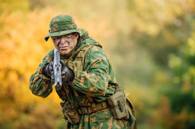 Russian soldier in the battlefield with a rifle