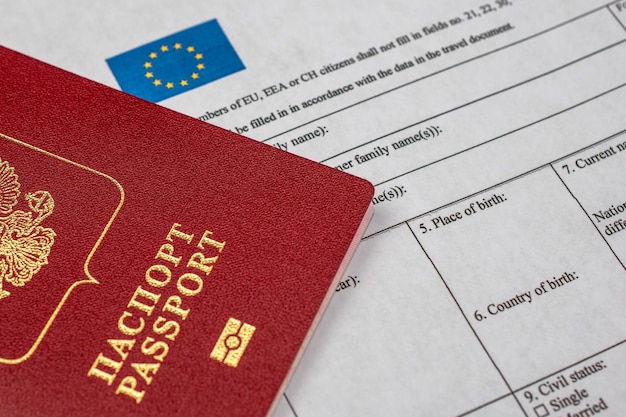 Russian travel passport with Schengen visa application form sanctions emigration immigration