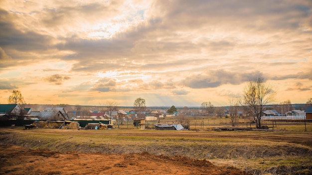 russian village landscape at sunset