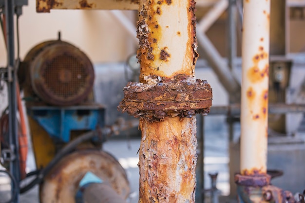 Rust damage paint and corrosion flange and bolt nut on pipeline drain industrial.