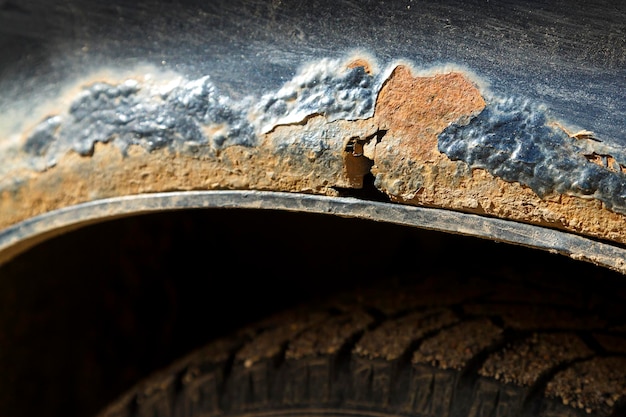 Rust on an old car over the wheels