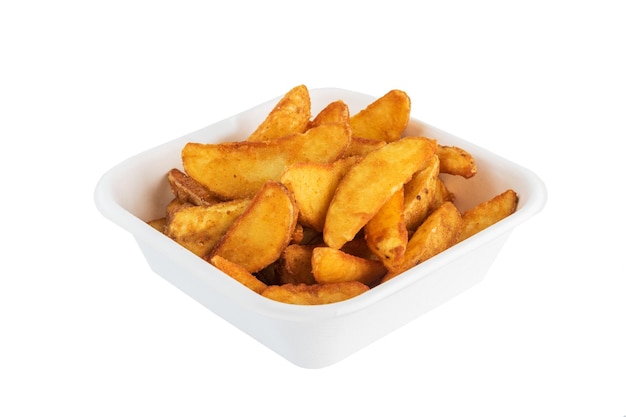 Rustic French fries in a cardboard disposable plate Isolated