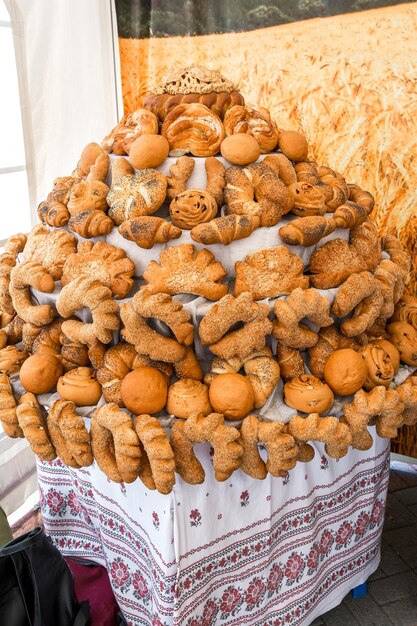 Rustic handmade bread and rolls are sold at a farmer's fair