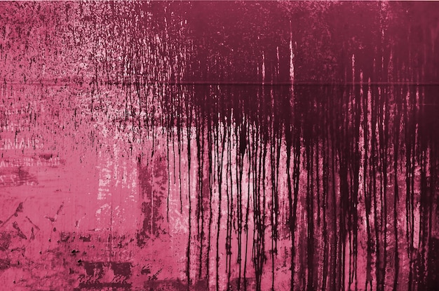 Rusty metal background Image toned in Viva Magenta color of the 2023 year