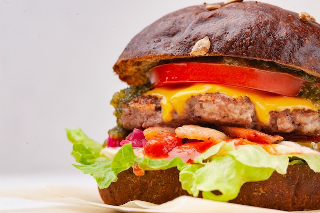 rye bun hamburger on the white background