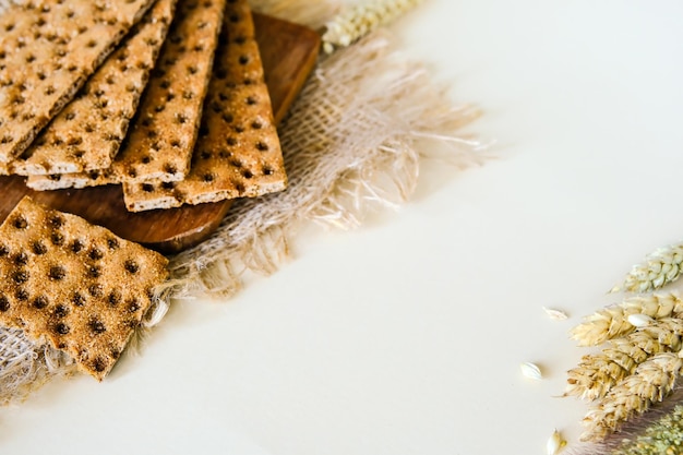 Rye crispbread Crispy dry bread Crispbread for sandwiches Bread replacement Wooden background Side view