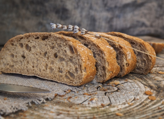 rye wheat bread sliced on a wooden board