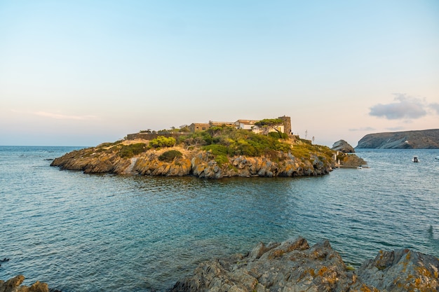 S'Arenella Island on the coast of Cadaques, a town on the Costa Brava of Catalonia, Gerona, Mediterranean Sea. Spain